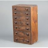 A Victorian pine collectors chest of 7 drawers with tore handles 76cm h x 43cm w x 29cm d Some