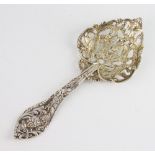A 19th Century Dutch pierced and cast silver sifter spoon with heart shaped bowl 30 grams