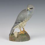 A Spode figure of a Montagu's Harrier, raised on a rocky base 20cm