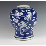 An 18th Century Chinese prunus baluster jar 27cm