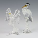 A Swarovski Crystal figure from The Silver Crystal Collection of a heron 14cm, ditto of an eagle