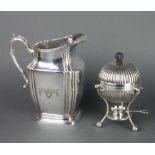 An American style silver plated water jug together with an egg coddler