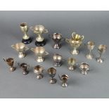 A quantity of silver plated miniature trophy cups