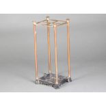 A Victorian copper and iron 4 section stick/umbrella stand complete with drip tray 55cm h x 23cm w x