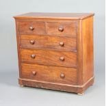 A Victorian mahogany D shaped chest of 2 short and 3 long drawers with tore handles, raised on a