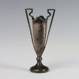 An Edwardian tapered silver trophy vase with twin handles 12cm, (weighted base)