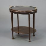An Edwardian Chippendale style oval mahogany 2 tier etagere with detachable glass bottomed tray,