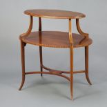An Edwardian oval inlaid mahogany 2 tier etagere, raised on outswept supports with X framed