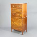An Edwardian inlaid mahogany chest on chest, the upper section with moulded cornice and canted