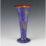 A Wedgwood Hummingbird lustre tapered blue ground vase with flared neck and with orange interior no.