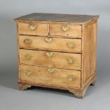 A Queen Anne oak chest of 2 short and 3 long drawers, raised on bracket feet 91cm h x 55cm d Split