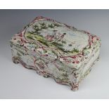 A 19th Century Veuve Perrin faience rectangular box and cover decorated the lid with a fete