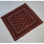 A blue and red ground Meshwani Gazak rug with central diamond shaped field 124cm x 115cm