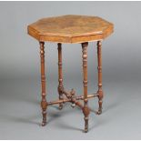 A Victorian octagonal quarter veneered figured walnut occasional table, raised on turned supports