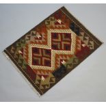 A black, brown and tan ground Maimana Kilim rug 84cm x 63cm