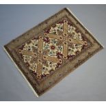 A brown and white ground Persian rug 124cm x 95cm