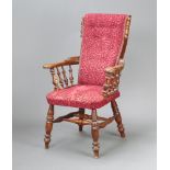 A Victorian mahogany open armchair with bobbin turned decoration, upholstered seat and back and