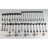 Twenty two silver plated lily pattern dessert spoons, 12 ditto sorbet spoons, 7 teaspoons and 5