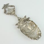 A 19th Century Dutch pierced and cast silver sifter spoon with a galleon handle, import marks
