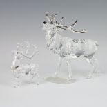 A Swarovski Crystal figure of a reindeer with metal antlers 14cm, a small ditto 8cm, boxed