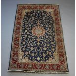 A blue and white ground Northwest Persian rug, floral patterned within a 3 row border 224cm x