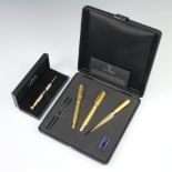 A cased Jakko pen set comprising a gilt fountain pen, a ditto ballpoint pen and a paper knife