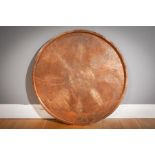 A LARGE COPPER CIRCULAR TRAY