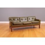 A GREEN LEATHER UPHOLSTERED CLUB SOFA, 1970's