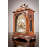 A WALNUT CASED BRACKET CLOCK, by WILLIAM MARSHALL, DUBLIN,  c.1730, with domed top and brass