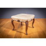 A Victorian mahogany footstool, by Robert Strahan