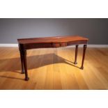 A GEORGIAN REVIVAL MAHOGANY SERPENTINE FRONTED SERVING TABLE