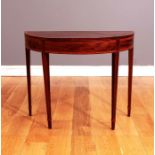 A MAHOGANY AND SATINWOOD CROSSBANDED AND EBONY LINE INLAID FOLD OVER TOP CARD TABLE