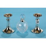 A PAIR OF ELIZABETH II CIRCULAR SILVER CANDLESTICKS, hallmarked for Birmingham, 4 1/4 ins high and a