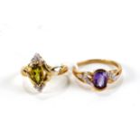 A 9CT YELLOW GOLD PERIDOT AND DIAMOND RING, size N and a 9ct gold amethyst and diamond RING, size Q,