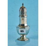 A GEORGE V OCTAGONAL VASE FORM SILVER SUGAR CASTER with slip on pierced cover, maker: EV,