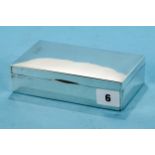 A GEORGE V RECTANGULAR SILVER CIGARETTE BOX, maker: PJE, Birmingham 1922, 6 ins x 3 1/2 ins.