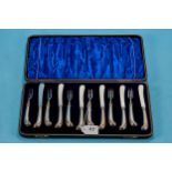 A SET OF SIX LATE VICTORIAN SILVER PISTOL-HANDLED TEA KNIVES AND FORKS, plated blades, maker GH,
