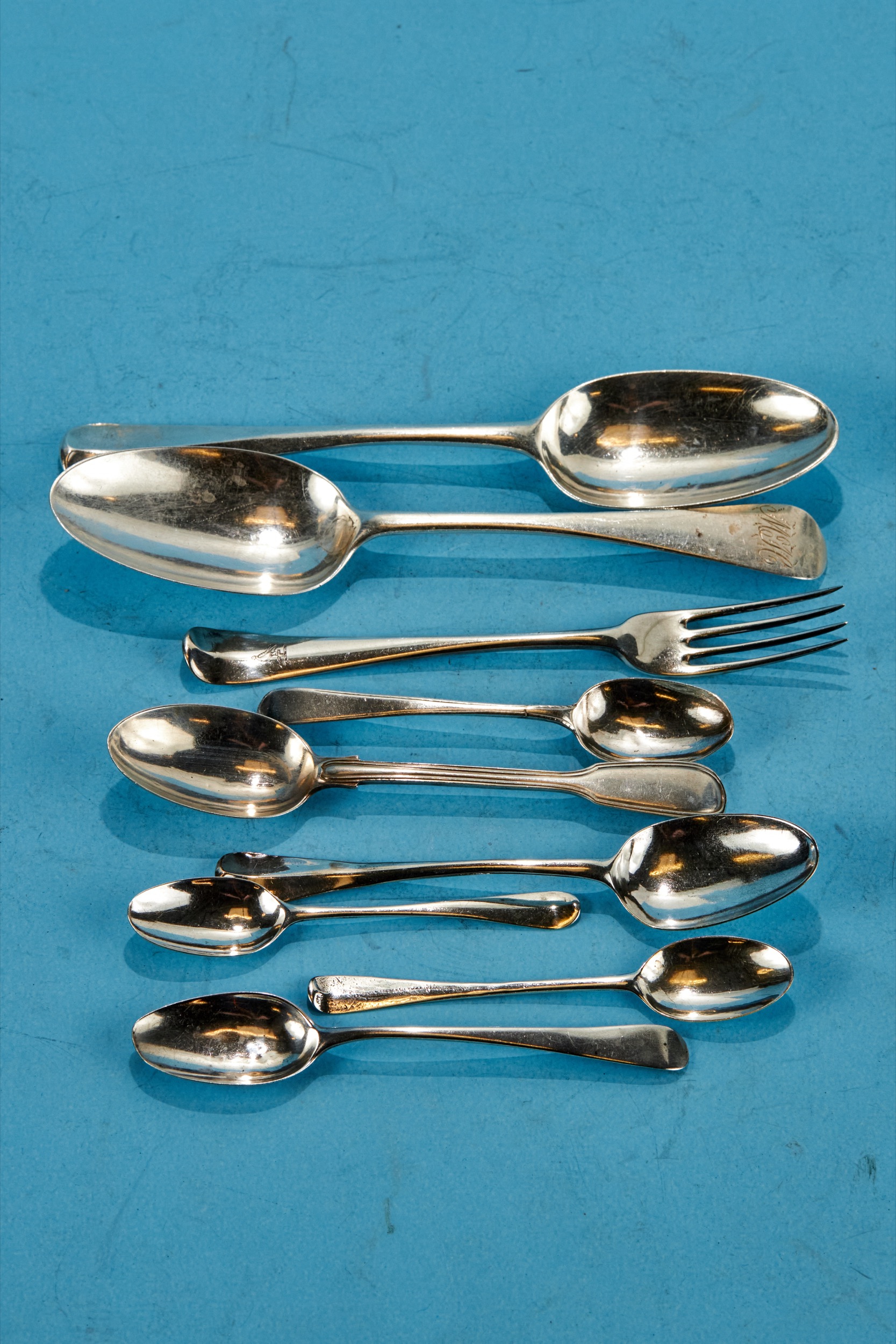 TWO GEORGE II SILVER DESSERT SPOONS, London 1731 and 1738, five various Georgian silver TEASPOONS, a