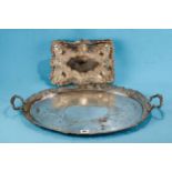 A 19TH CENTURY OVAL SILVER PLATED ON COPPER TEA TRAY with serpent handles, pierced border and