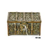 AN EARLY 20TH CENTURY BRASS GOTHIC REVIVAL RELIQUARY STYLE CASKET with relief panels of figures,