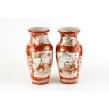 A PAIR OF 19TH CENTURY JAPANESE KUTANI PORCELAIN VASES finely decorated with panels of peacocks