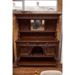 A LATE 19TH CENTURY BELGIAN CARVED OAK MIRROR BACK SIDEBOARD with lion mask frieze drawers,