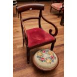 A REGENCY PERIOD MAHOGANY SCROLL-ARM ELBOW CHAIR, upholstered seat raised on turned and fluted