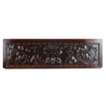 AN ANTIQUE RECTANGULAR OAK PANEL carved in high relief with a central urn of fruit, scrolling