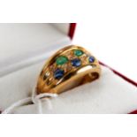 A 9CT YELLOW GOLD SAPPHIRE, EMERALD AND DIAMOND RING, stamped 375, size T, approximately 6.2 grams.