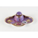 A 19TH CENTURY PORCELAIN INKSTAND, mauve ground quatrefoil base, detachable inkwell with hinged