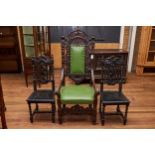 A LARGE LATE 19TH CENTURY BELGIAN CARVED OAK ELBOW CHAIR the lunette crest rail flanked by turned