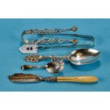 A PAIR OF GEORGIAN PLAIN SILVER SUGAR TONGS, maker: SG. EW. IB, London 1811, a pair of pierced