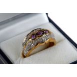 A 9CT YELLOW GOLD AMETHYST AND DIAMOND RING, size Q, approximately 5.2 grams.