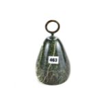 A VICTORIAN POLISHED SERPENTINE STONE PEAR SHAPED DOORSTOP with brass ring handle, 8 ins high.